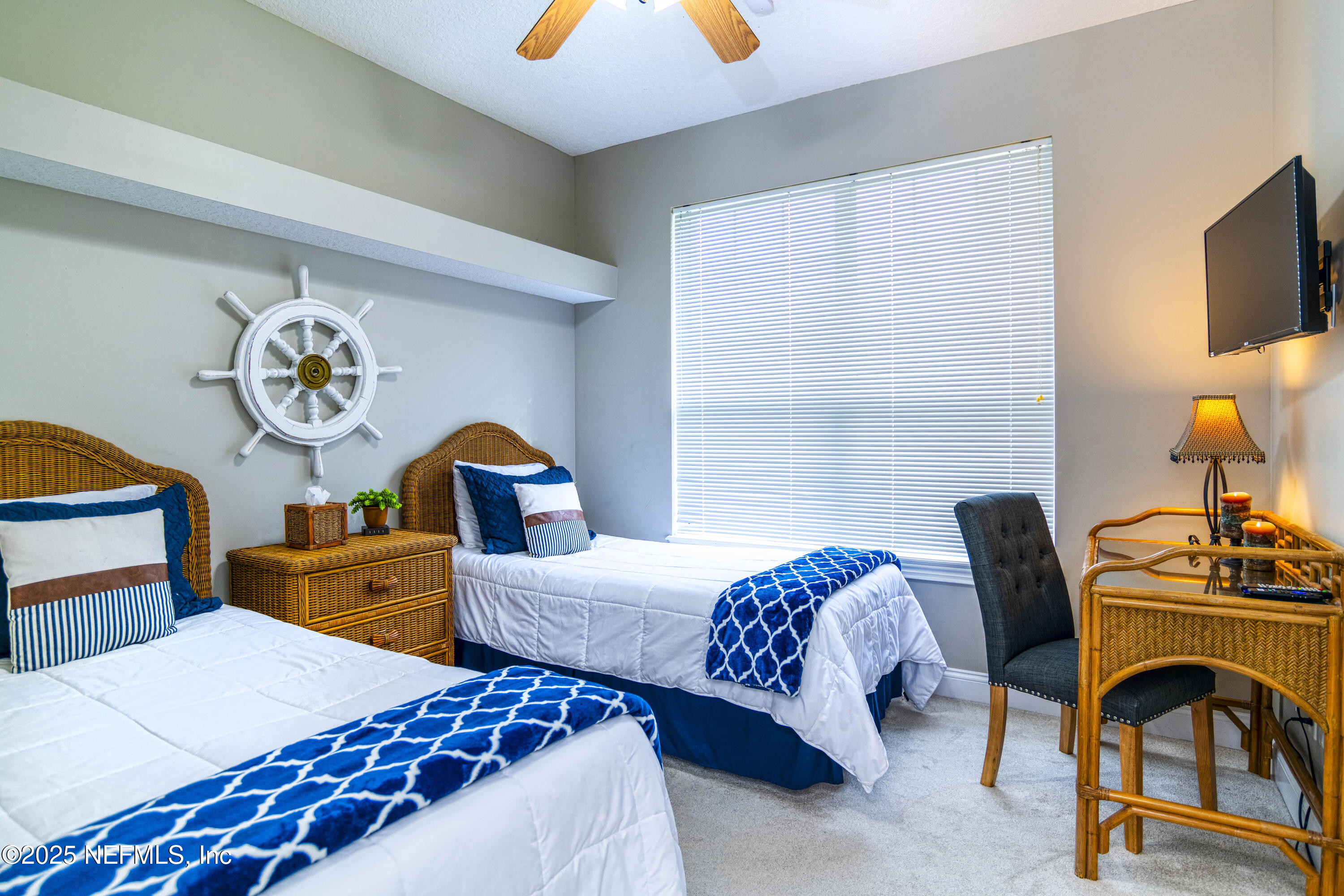 341 Island Green Drive St. Augustine, FL 32092 - Photo 26 of 49 a bedroom with two beds and a dresser