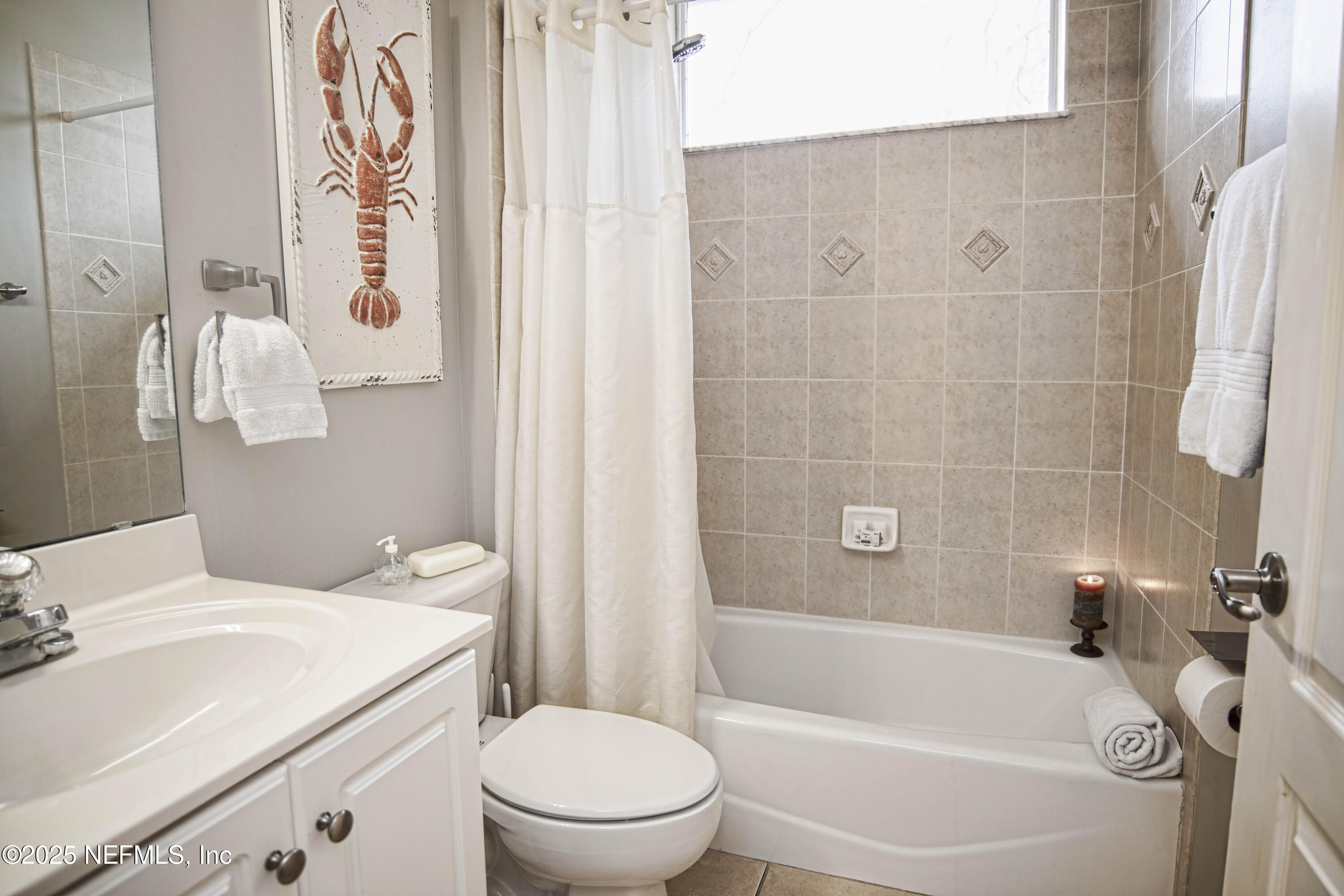 341 Island Green Drive St. Augustine, FL 32092 - Photo 28 of 49 a bathroom with a sink toilet and shower