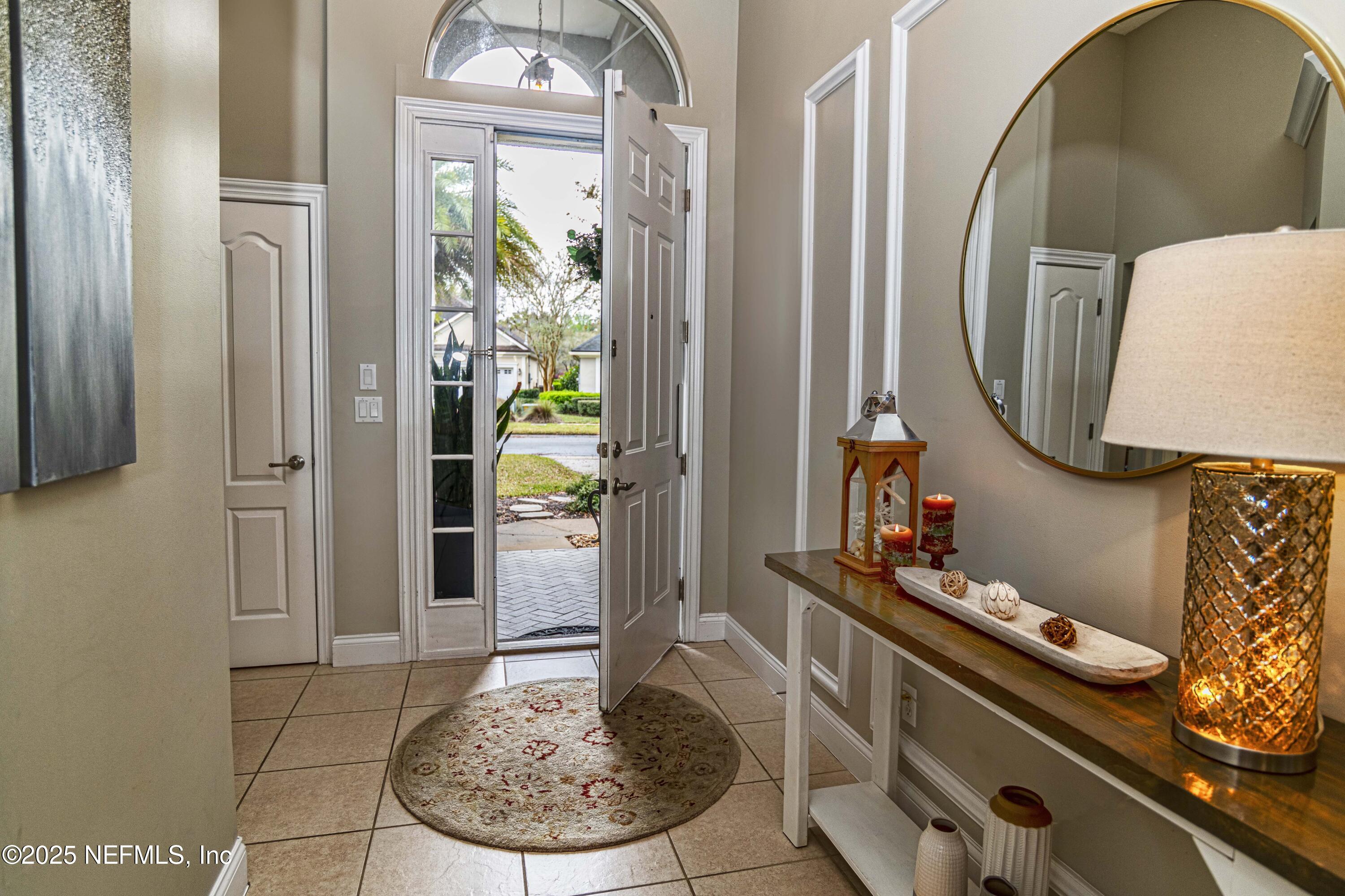 341 Island Green Drive St. Augustine, FL 32092 - Photo 35 of 49 a very nice looking dining room with a table and chairs