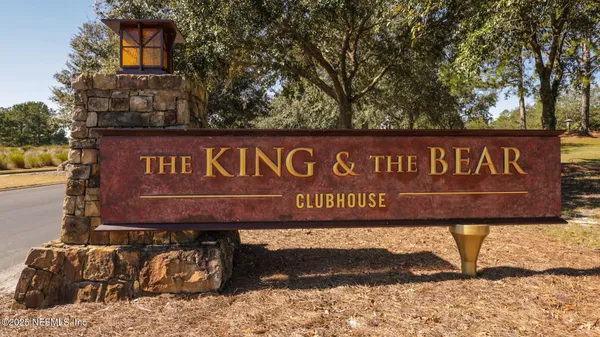 a sign broad on the side of the road