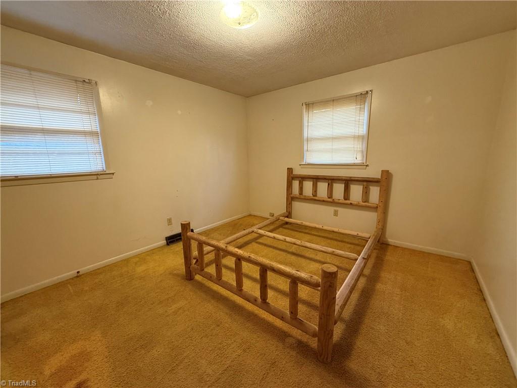 1257 Bethesda Church Road Ruffin, NC 27326 - Photo 9 of 15 Primary Bedroom with 1/2 bath ensuite