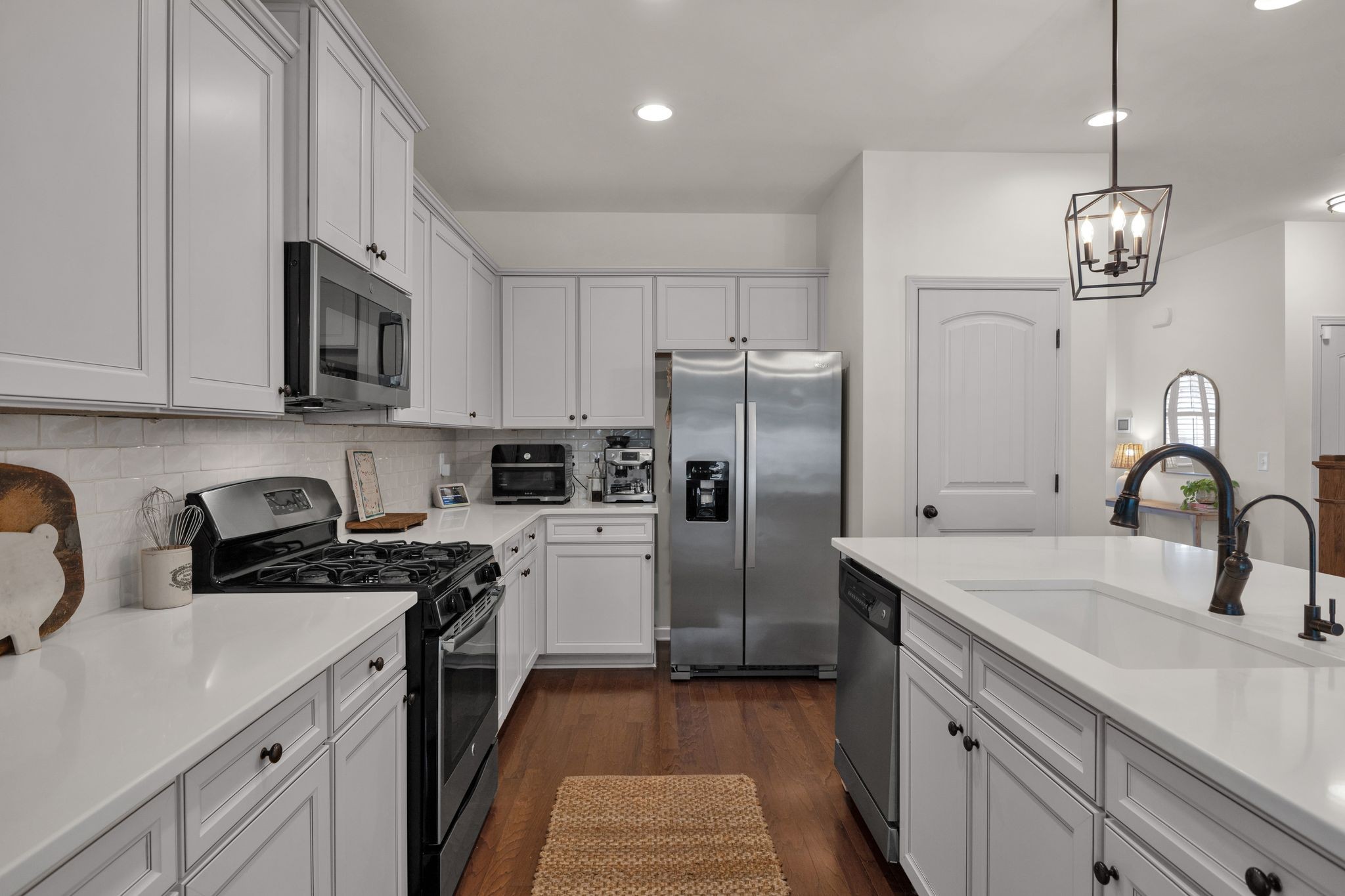 2020 Austin Drive Spring Hill, TN 37174 - Photo 15 of 40 a kitchen with a sink stainless steel appliances a refrigerator and a sink