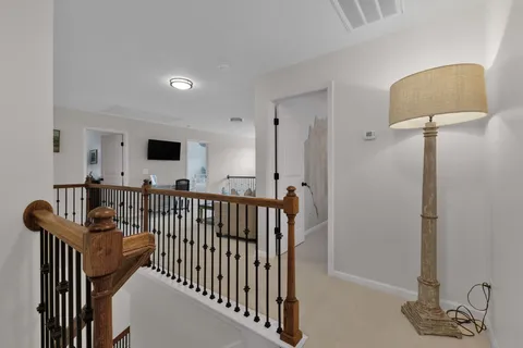 a view of entryway with wooden floor