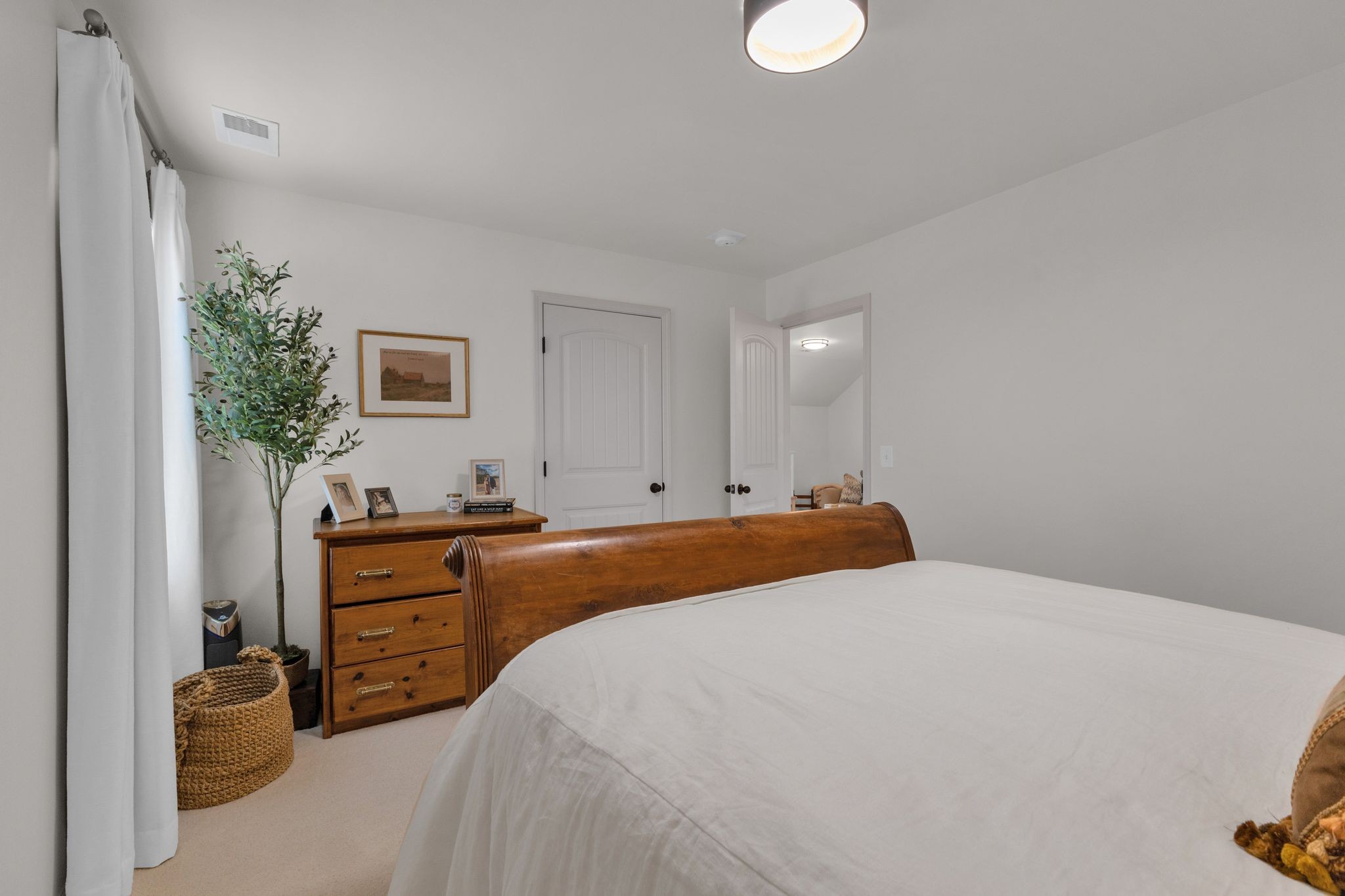 2020 Austin Drive Spring Hill, TN 37174 - Photo 31 of 40 a bedroom with a bed and a dresser