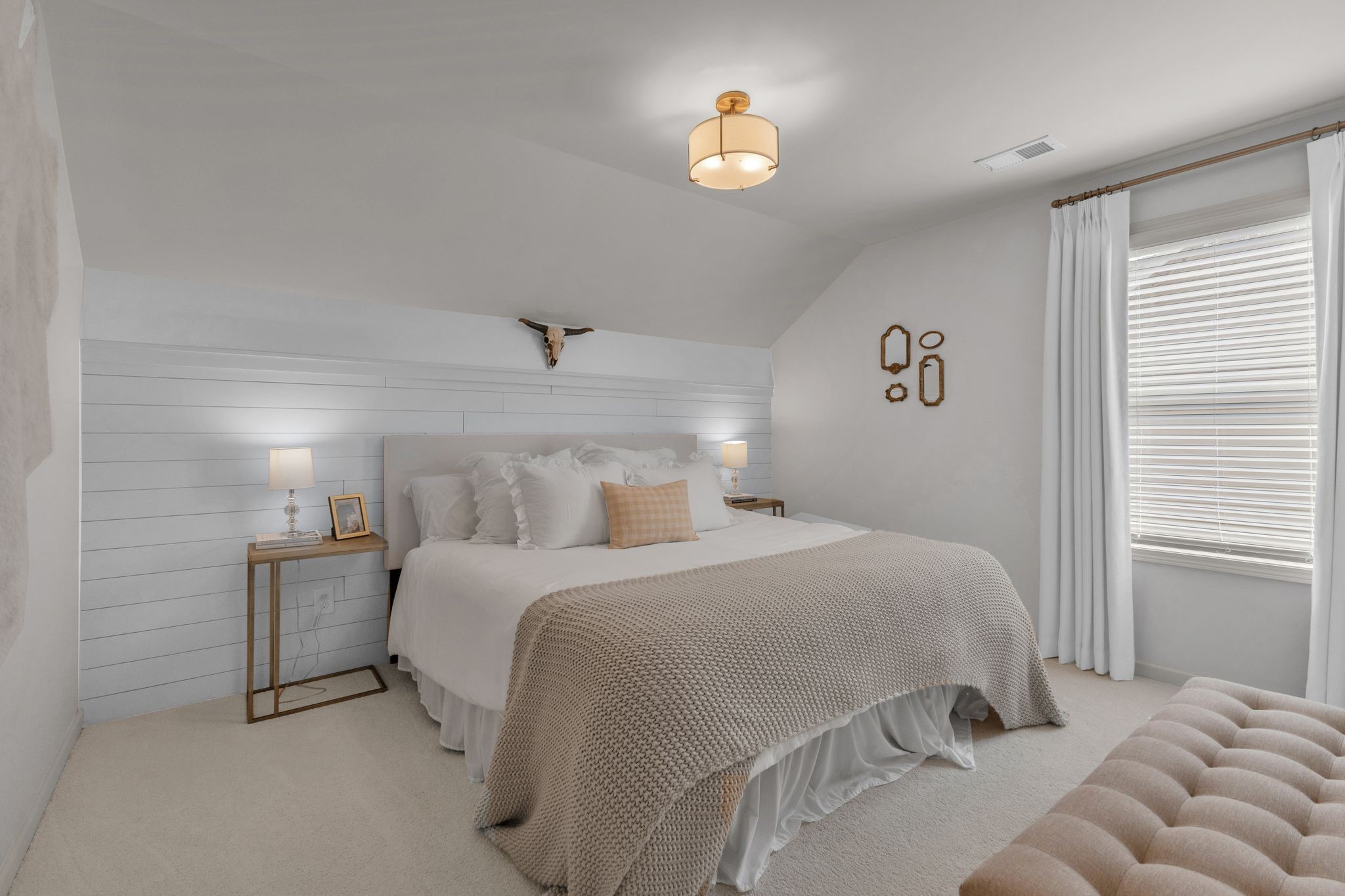 2020 Austin Drive Spring Hill, TN 37174 - Photo 32 of 40 a bedroom with a bed and a chandelier