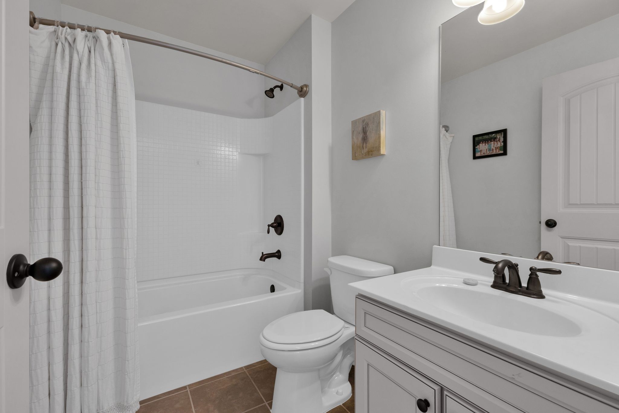 2020 Austin Drive Spring Hill, TN 37174 - Photo 34 of 40 a bathroom with a sink toilet and shower