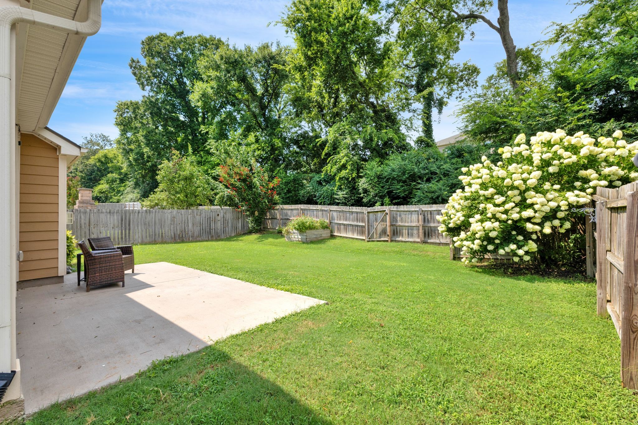 2020 Austin Drive Spring Hill, TN 37174 - Photo 40 of 40 a small garden covered with tall trees