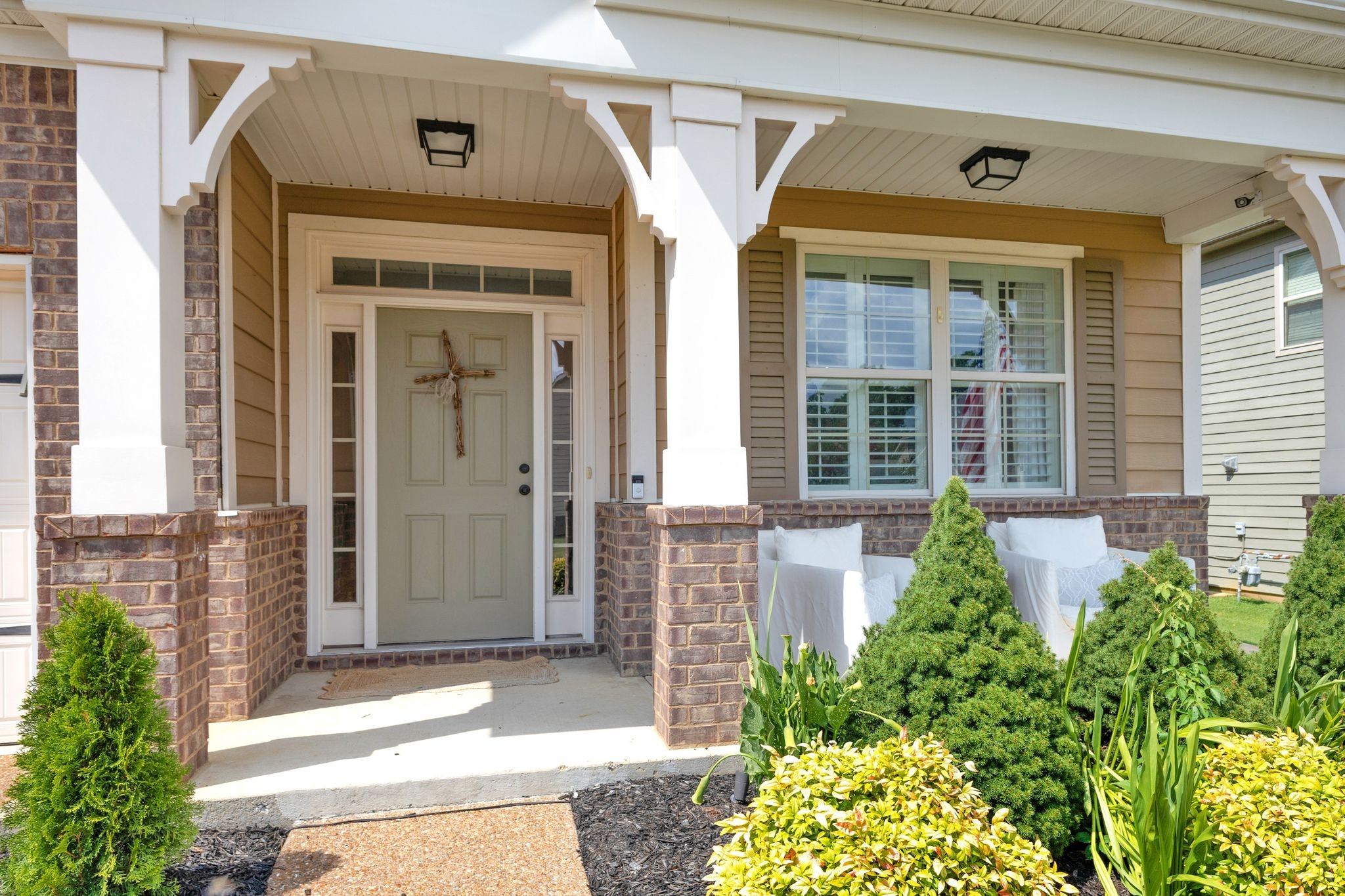 2020 Austin Drive Spring Hill, TN 37174 - Photo 5 of 40 a front view of a house with a garden