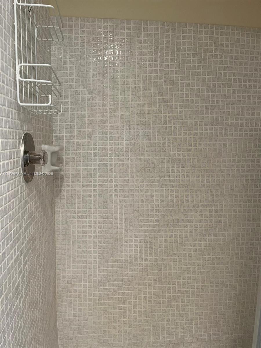 4200 North Hwy A1A, Unit 614 Fort Pierce, FL 34949 - Photo 25 of 63 a bathroom with a shower