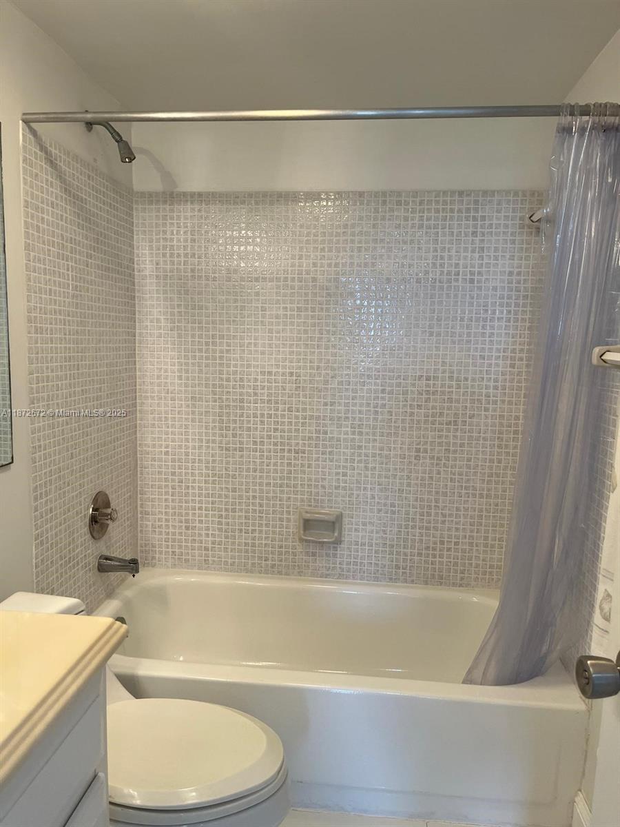 4200 North Hwy A1A, Unit 614 Fort Pierce, FL 34949 - Photo 28 of 63 a bathroom with a bathtub and a shower