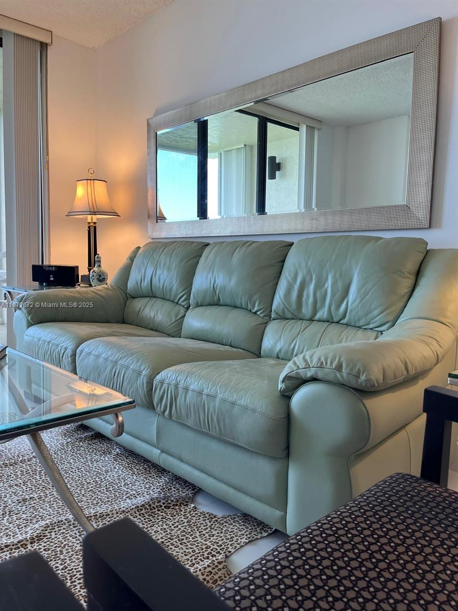 4200 North Hwy A1A, Unit 614 Fort Pierce, FL 34949 - Photo 46 of 63 a living room with furniture and a couch