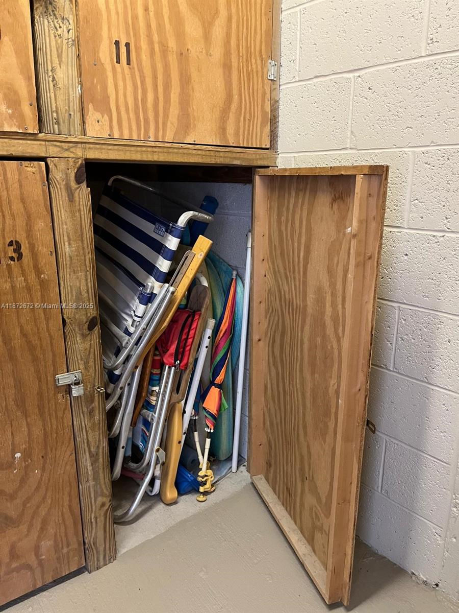 4200 North Hwy A1A, Unit 614 Fort Pierce, FL 34949 - Photo 56 of 63 a view of walk in closet with clothes