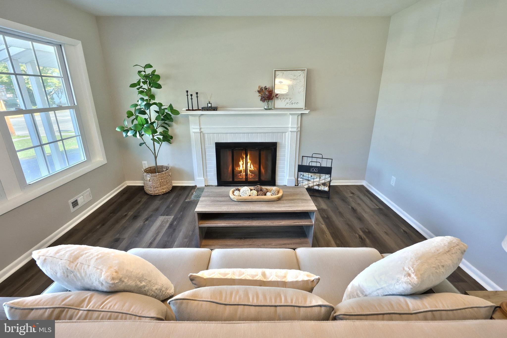 200 West Main Street Shiremanstown, PA 17011 - Photo 15 of 41 a living room with furniture and a fireplace