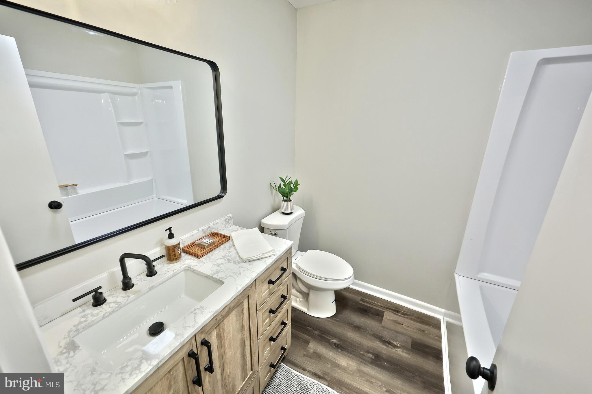 200 West Main Street Shiremanstown, PA 17011 - Photo 26 of 41 a bathroom with a sink and a mirror