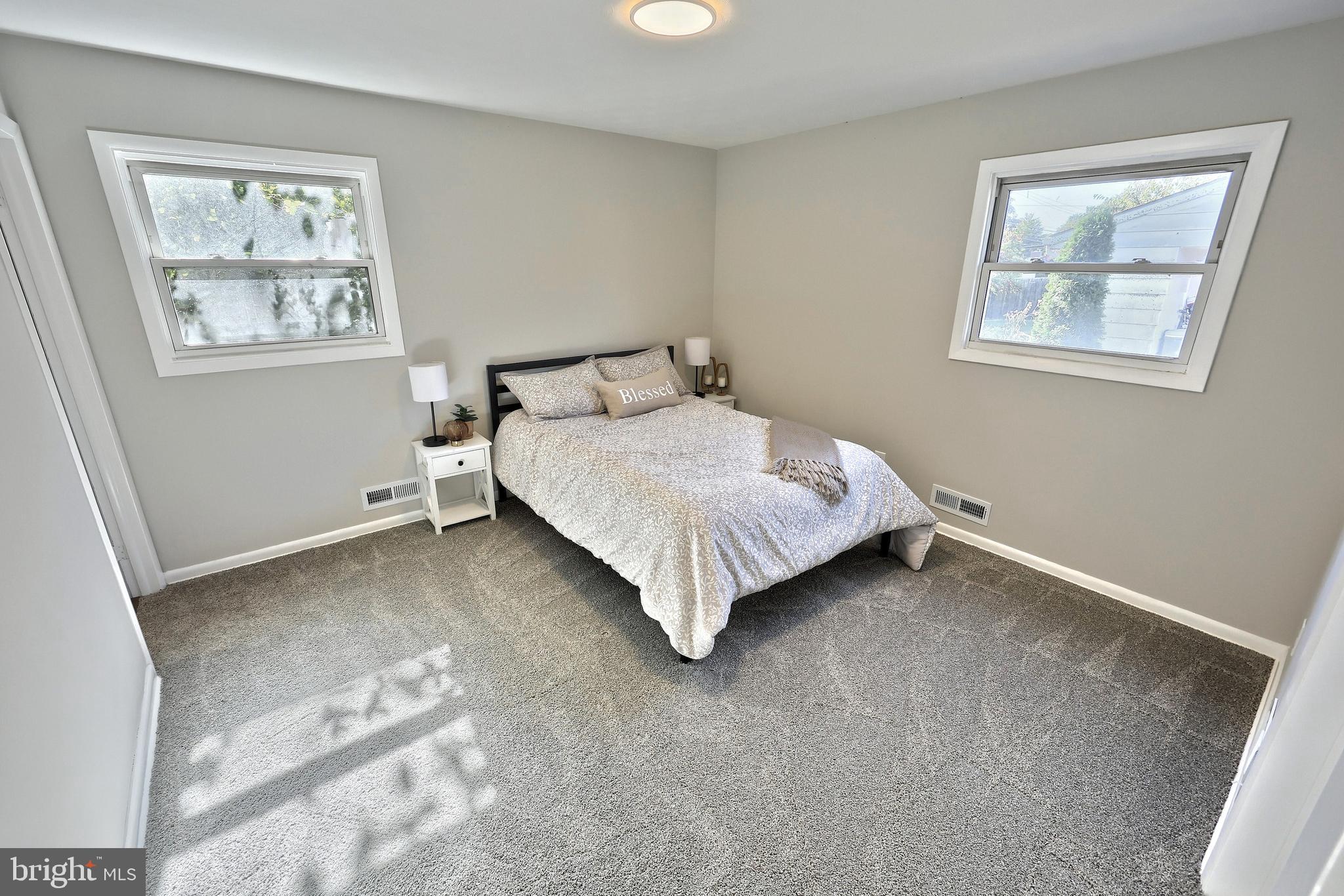 200 West Main Street Shiremanstown, PA 17011 - Photo 29 of 41 a bed sitting in a bedroom next to a window