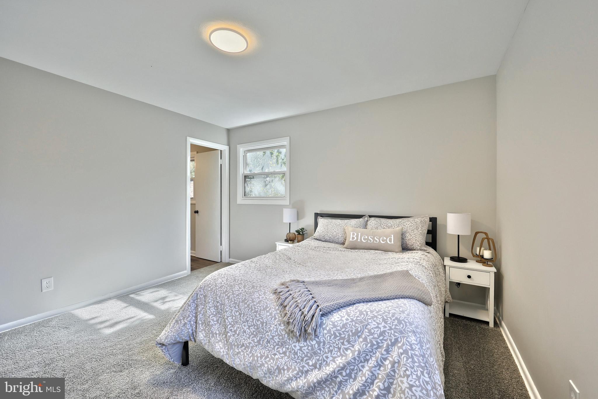 200 West Main Street Shiremanstown, PA 17011 - Photo 30 of 41 a bedroom with a bed and window