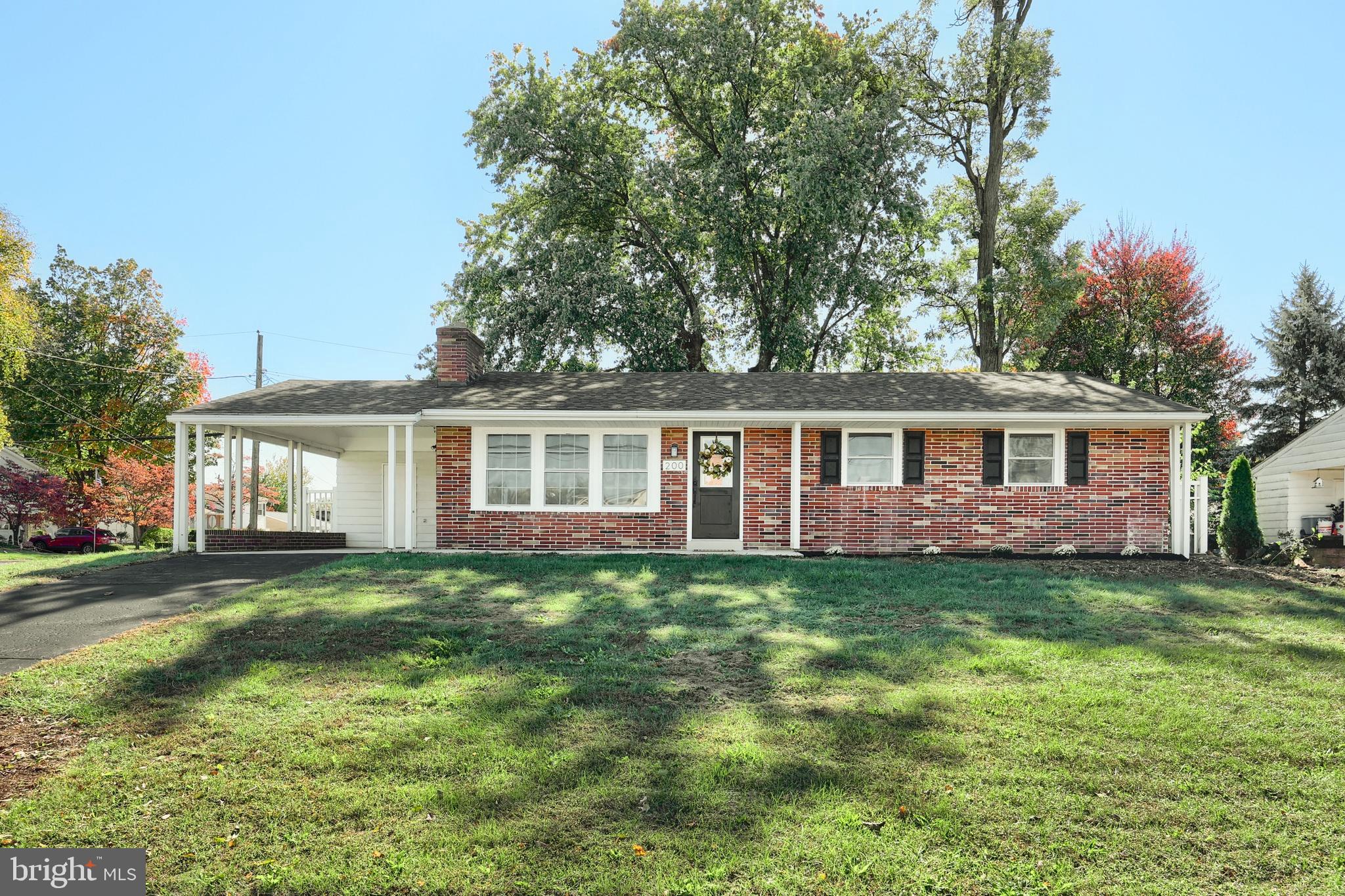 200 West Main Street Shiremanstown, PA 17011 - Photo 3 of 41 a front view of a house with a garden