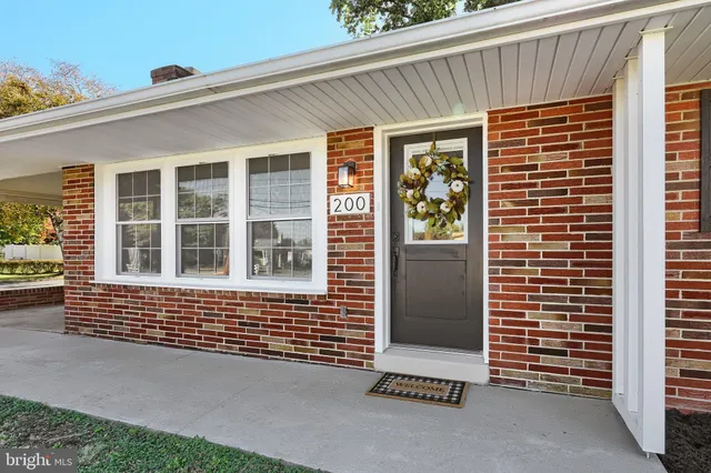 a front view of a house with a garage