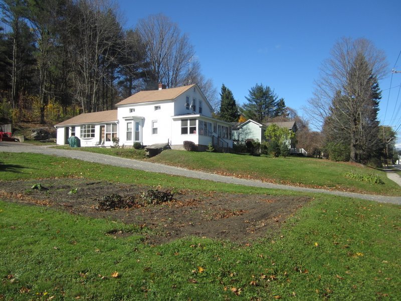 102 South Main Road Otis, MA 01253 - Photo 19 of 25 a view of a big house with a big yard and large trees