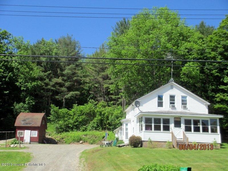 102 South Main Road Otis, MA 01253 - Photo 24 of 25 a view of a house with a yard