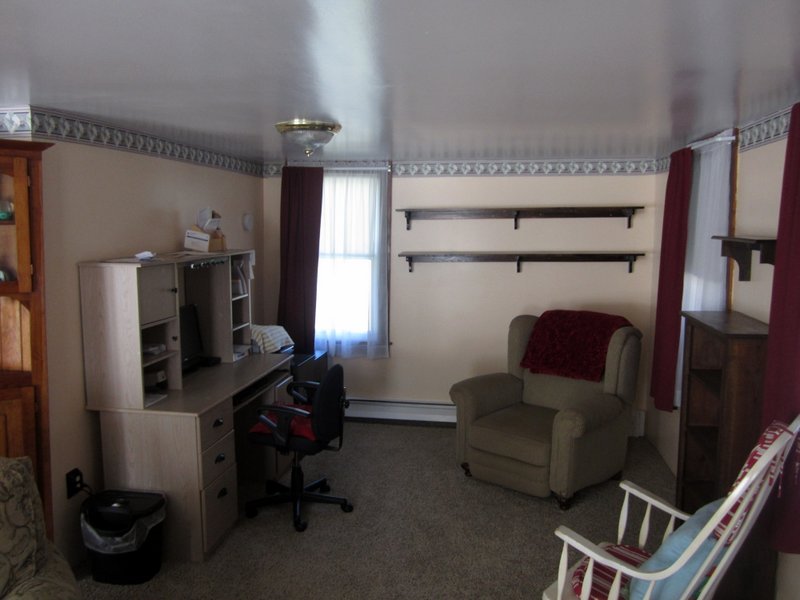 102 South Main Road Otis, MA 01253 - Photo 6 of 25 a living room with furniture and a flat screen tv