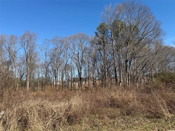 a sign that is on a brick wall