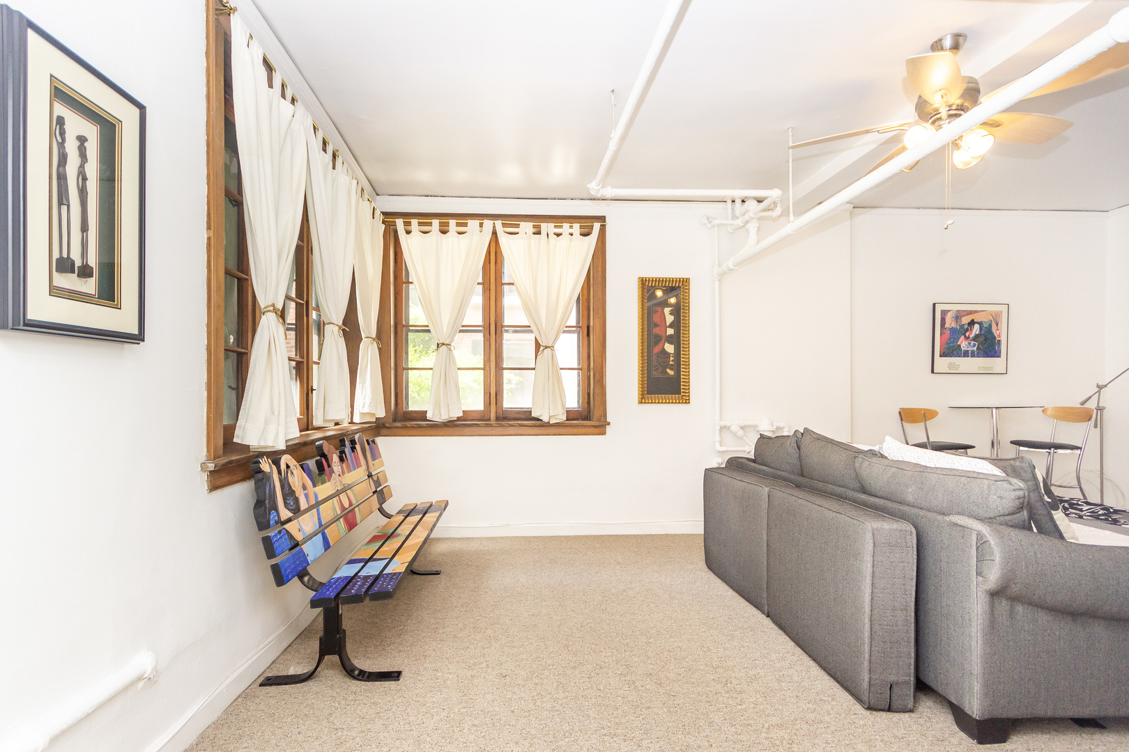 1360 East Madison Park, Unit B Chicago, IL 60615 - Photo 12 of 19 a living room with furniture and a window