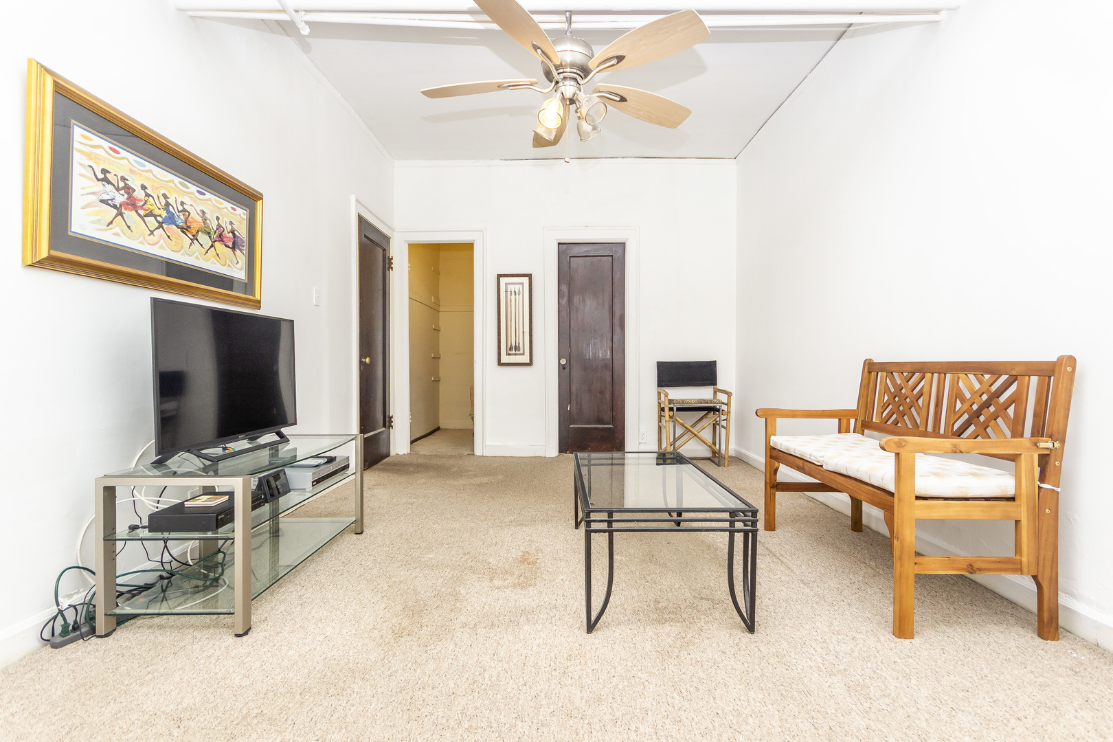 1360 East Madison Park, Unit B Chicago, IL 60615 - Photo 10 of 19 a view of a livingroom with workspace and a window