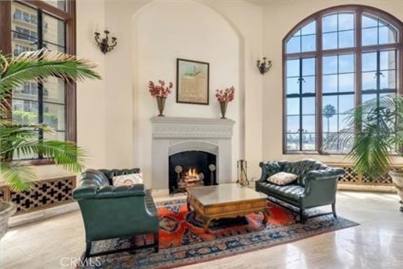 800 East Ocean Boulevard, Unit 1404 Long Beach, CA 90802 - Photo 16 of 25 a living room with furniture and a fireplace