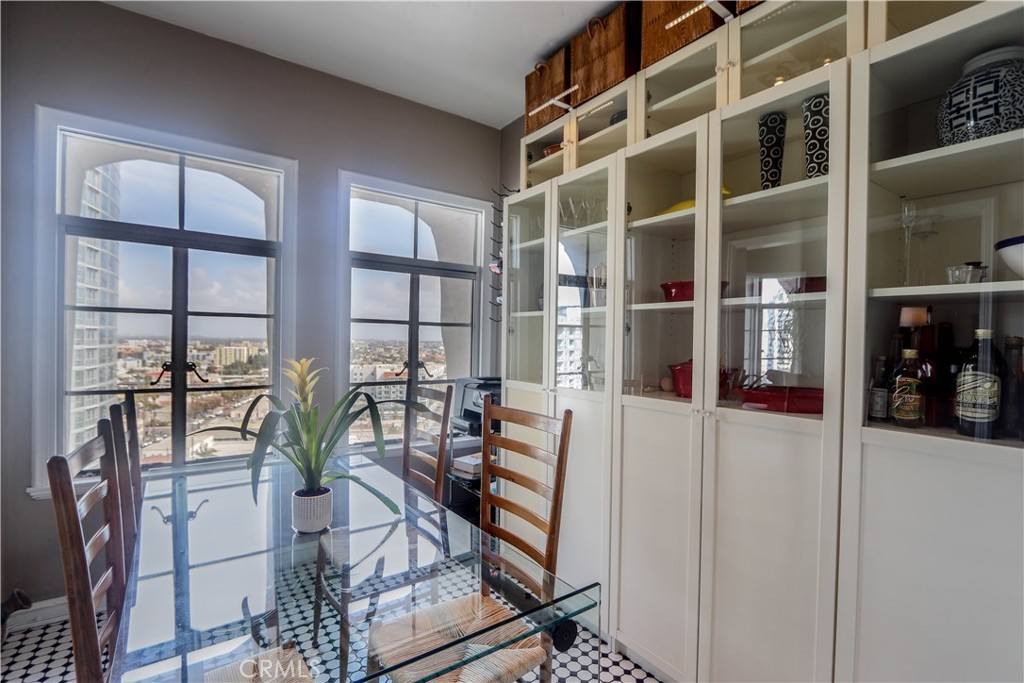 800 East Ocean Boulevard, Unit 1404 Long Beach, CA 90802 - Photo 9 of 25 a view of a livingroom with furniture and floor to ceiling window