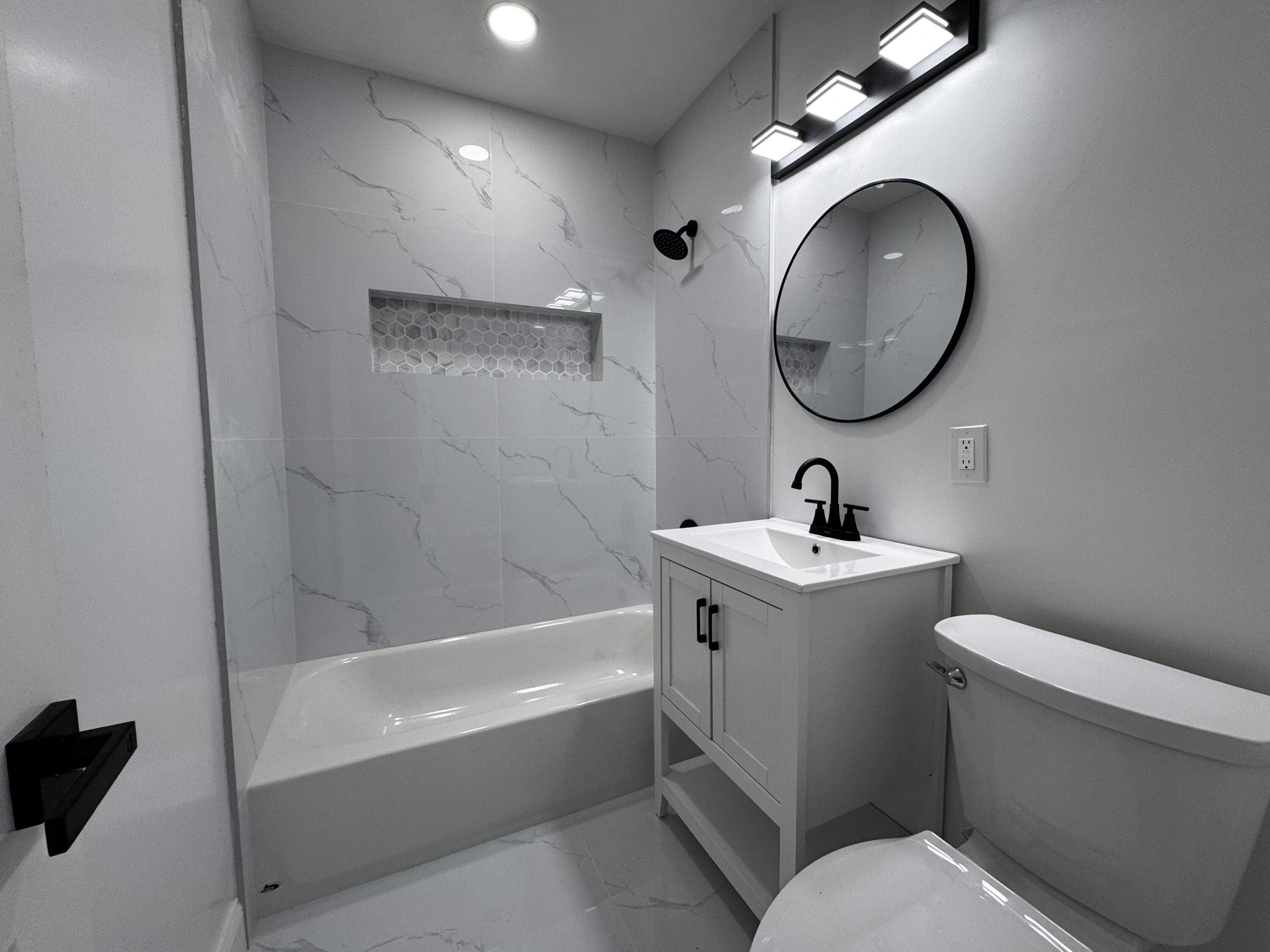 8805 Southwest 43rd Terrace Miami, FL 33165 - Photo 5 of 7 a bathroom with a sink mirror vanity and toilet