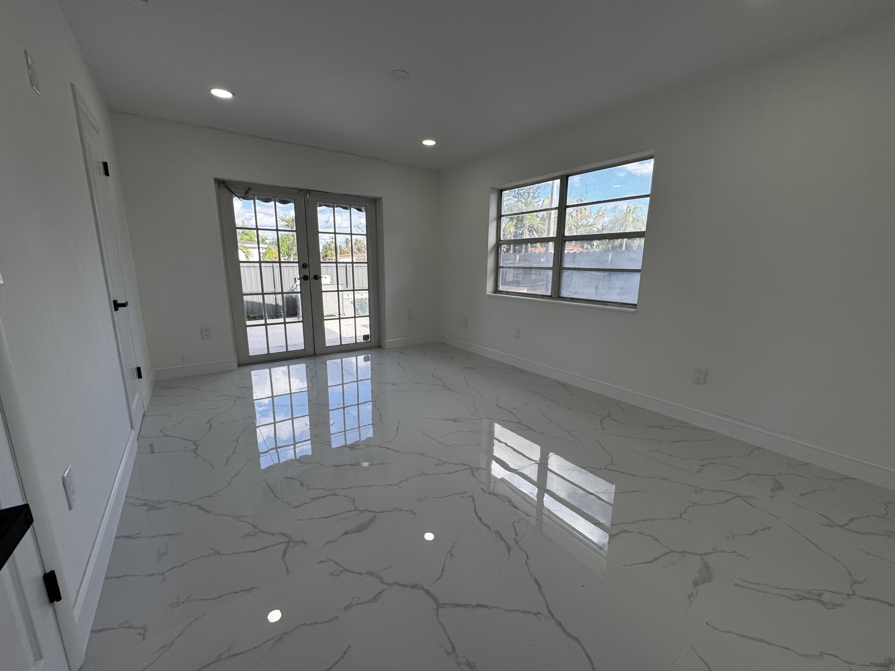 8805 Southwest 43rd Terrace Miami, FL 33165 - Photo 6 of 7 a view of an empty room and window