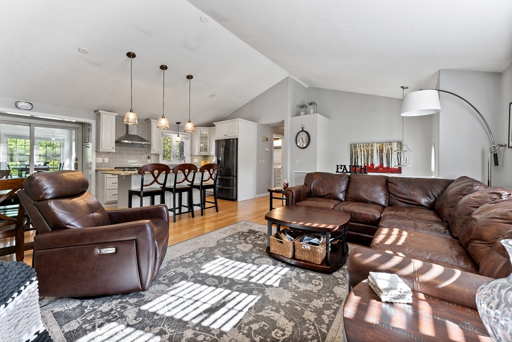 47 Deer Run Road West Springfield, MA 01089 - Photo 11 of 41 a living room with furniture a couch and a chandelier