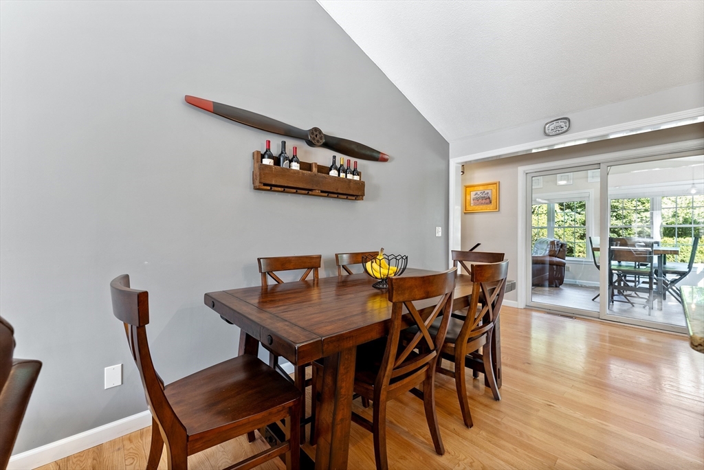 47 Deer Run Road West Springfield, MA 01089 - Photo 14 of 41 a view of a dining room with furniture and wooden floor