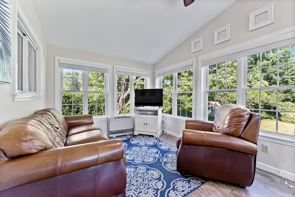 47 Deer Run Road West Springfield, MA 01089 - Photo 15 of 41 a living room with furniture flat screen tv and a large window