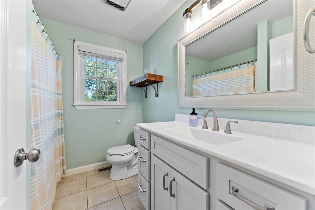 47 Deer Run Road West Springfield, MA 01089 - Photo 22 of 41 a bathroom with a sink a toilet and shower