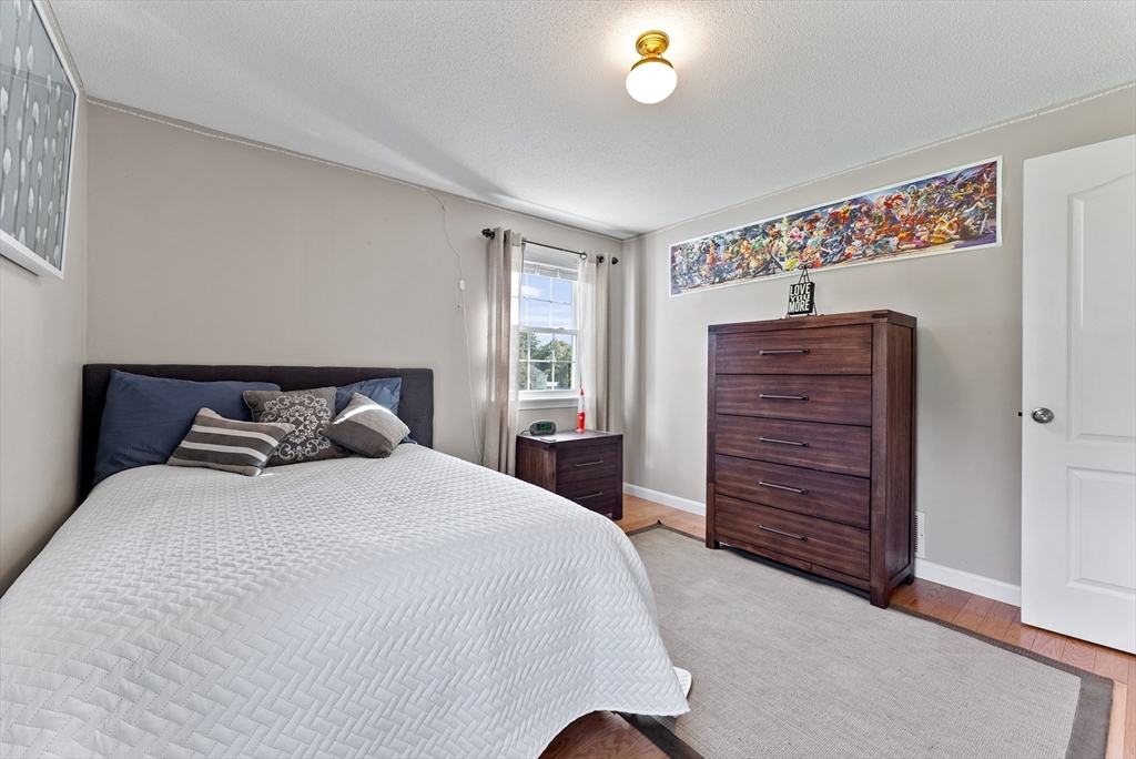47 Deer Run Road West Springfield, MA 01089 - Photo 23 of 41 a bedroom with a bed and a dresser