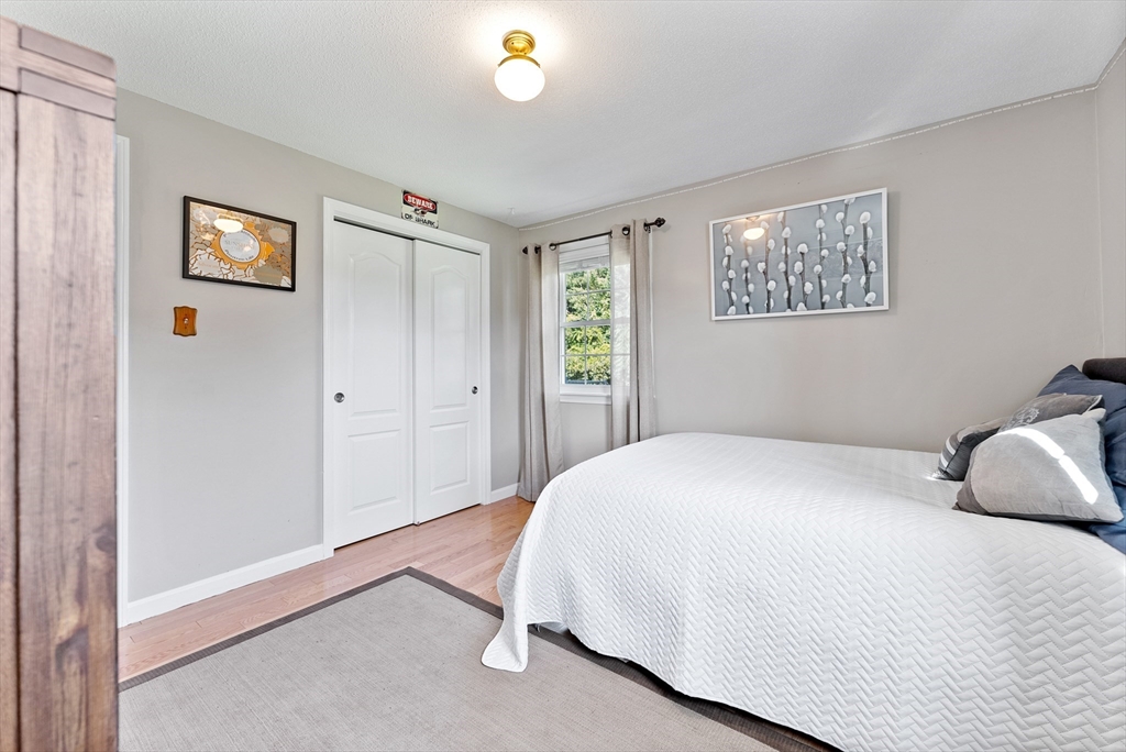 47 Deer Run Road West Springfield, MA 01089 - Photo 24 of 41 a bedroom with a bed and a window