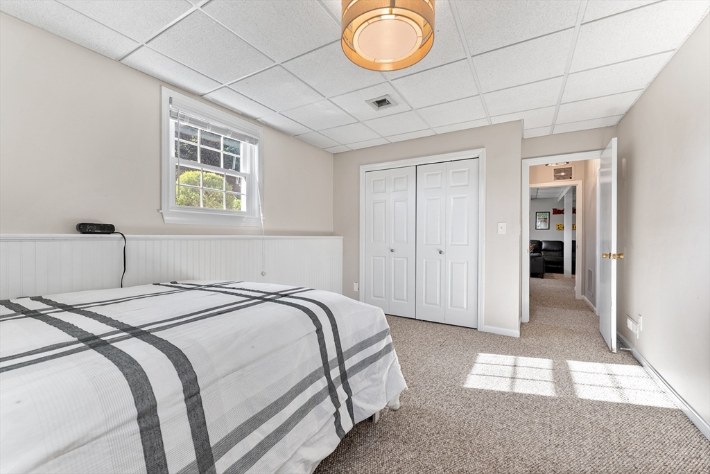 47 Deer Run Road West Springfield, MA 01089 - Photo 29 of 41 a bedroom with a bed and a window