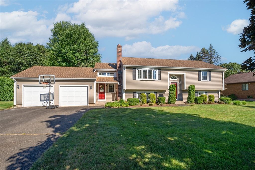 47 Deer Run Road West Springfield, MA 01089 - Photo 3 of 41 front view of a house with a yard