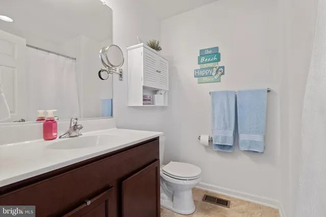 a workspace with furniture and a window