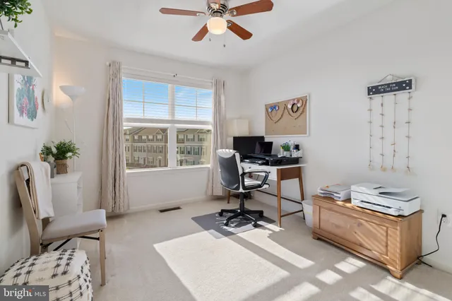 a view of a house with wooden floor and a sink