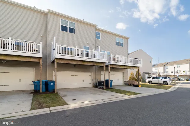 a front view of a building with street view