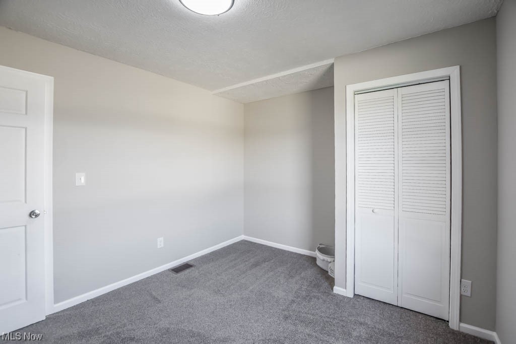 7004 Streeter Road Windham, OH 44288 - Photo 14 of 31 Bedroom 2 with textured ceiling, and a closet