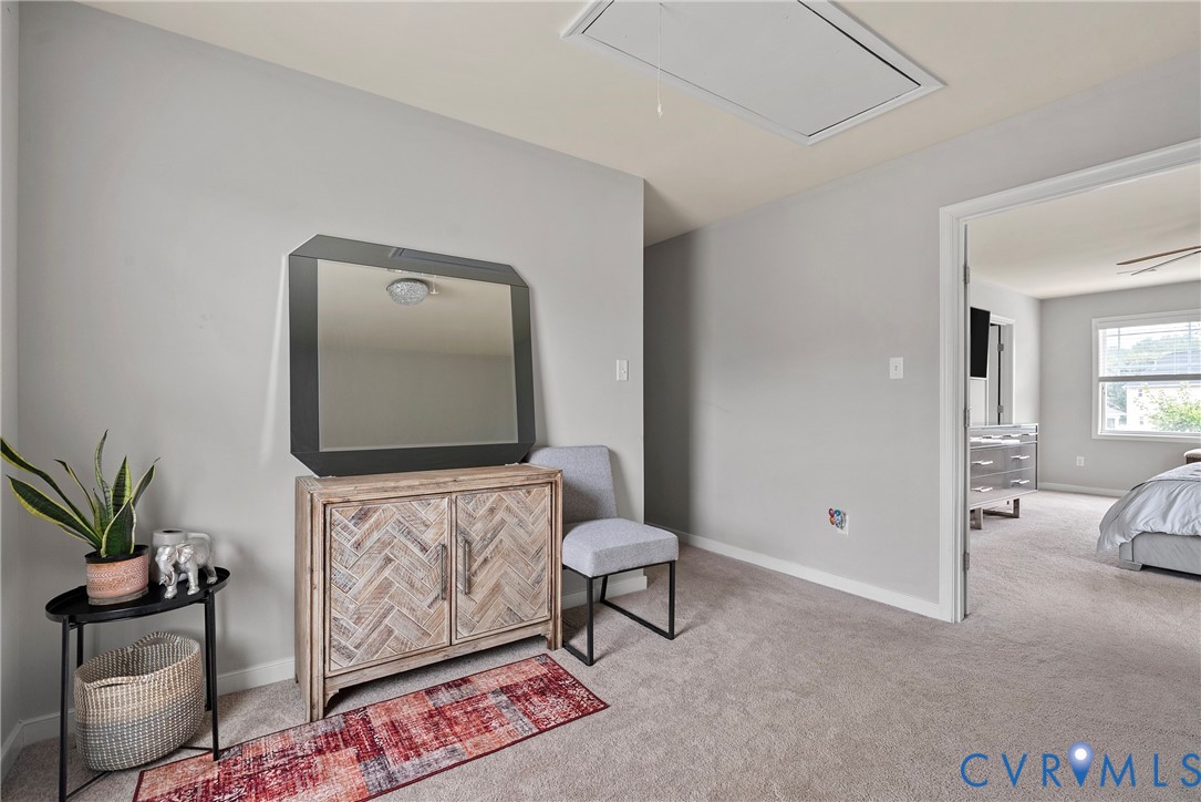 11223 Hill Ridge Court Ashland, VA 23005 - Photo 18 of 35 a living room with furniture and a potted plant