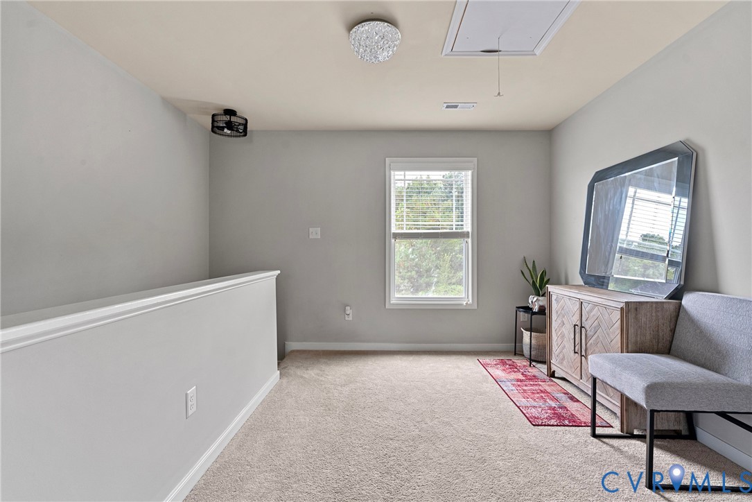 11223 Hill Ridge Court Ashland, VA 23005 - Photo 19 of 35 a living room with furniture and a window