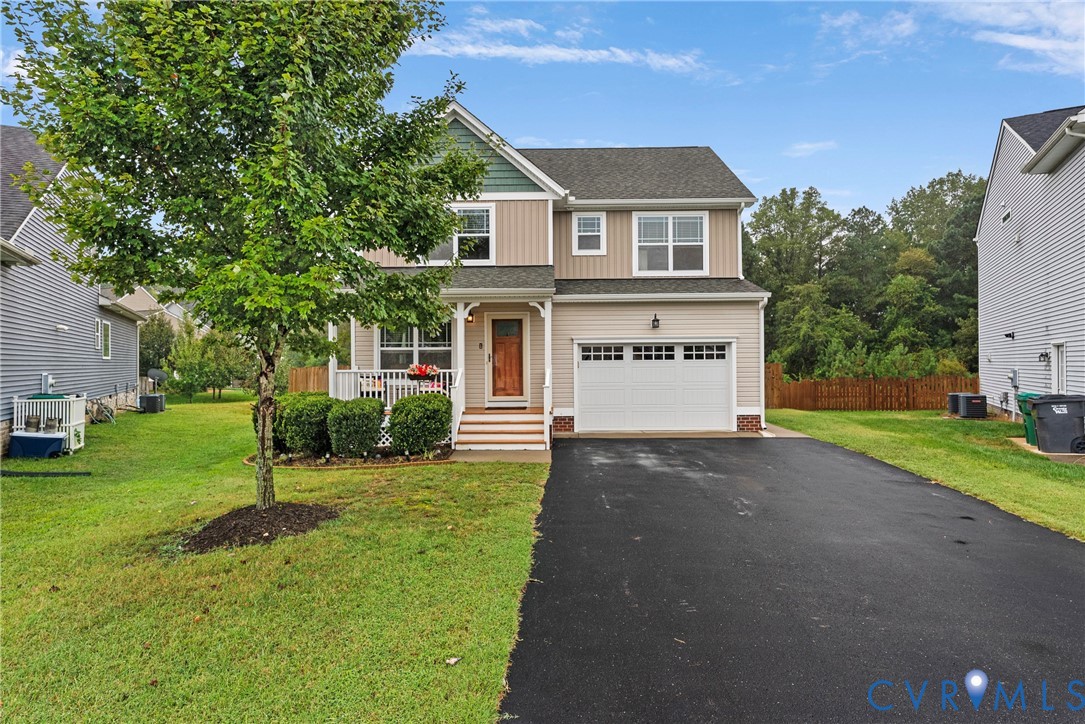 11223 Hill Ridge Court Ashland, VA 23005 - Photo 2 of 35 a view of a house with a yard