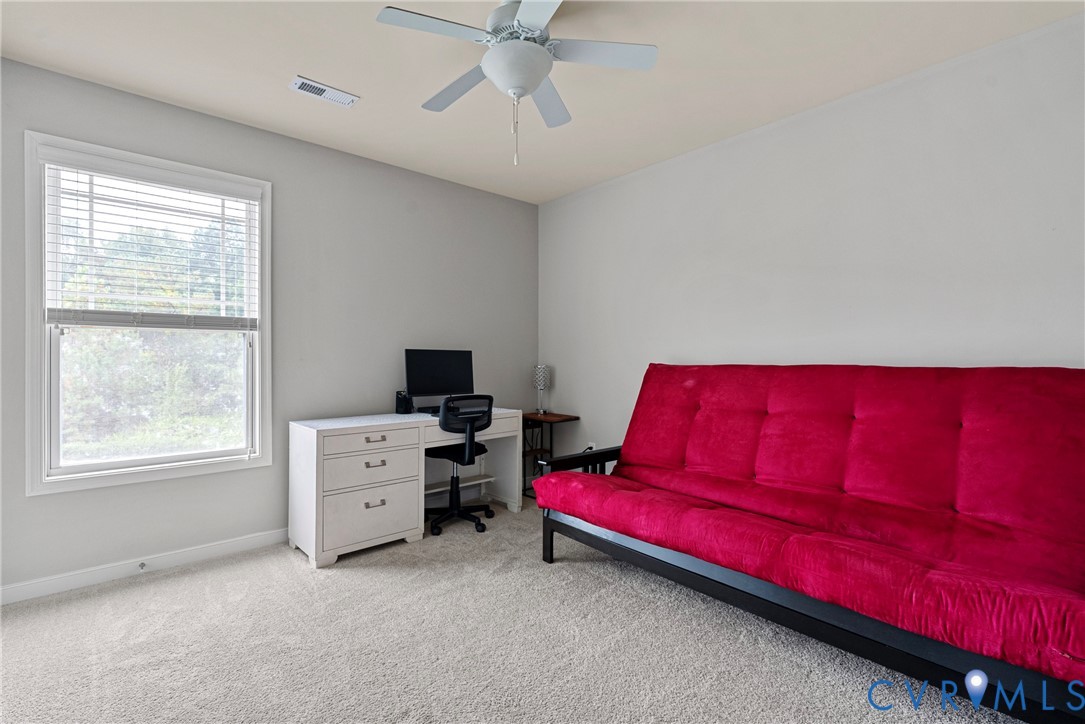 11223 Hill Ridge Court Ashland, VA 23005 - Photo 28 of 35 a living room with furniture and a window