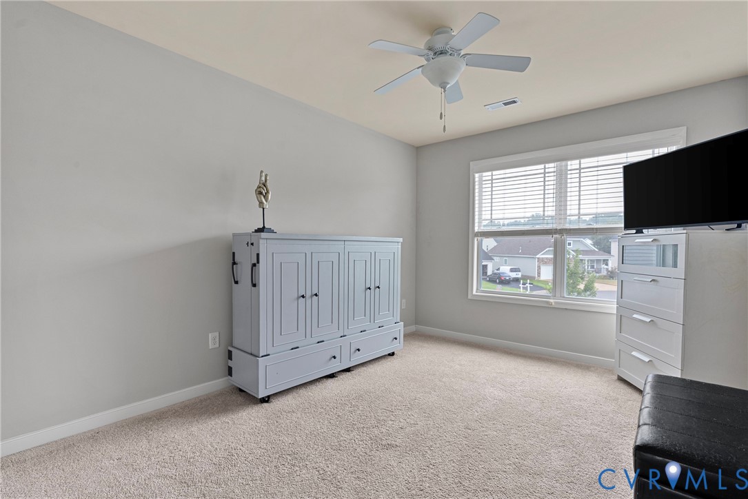 11223 Hill Ridge Court Ashland, VA 23005 - Photo 30 of 35 a view of livingroom with hardwood floor and window