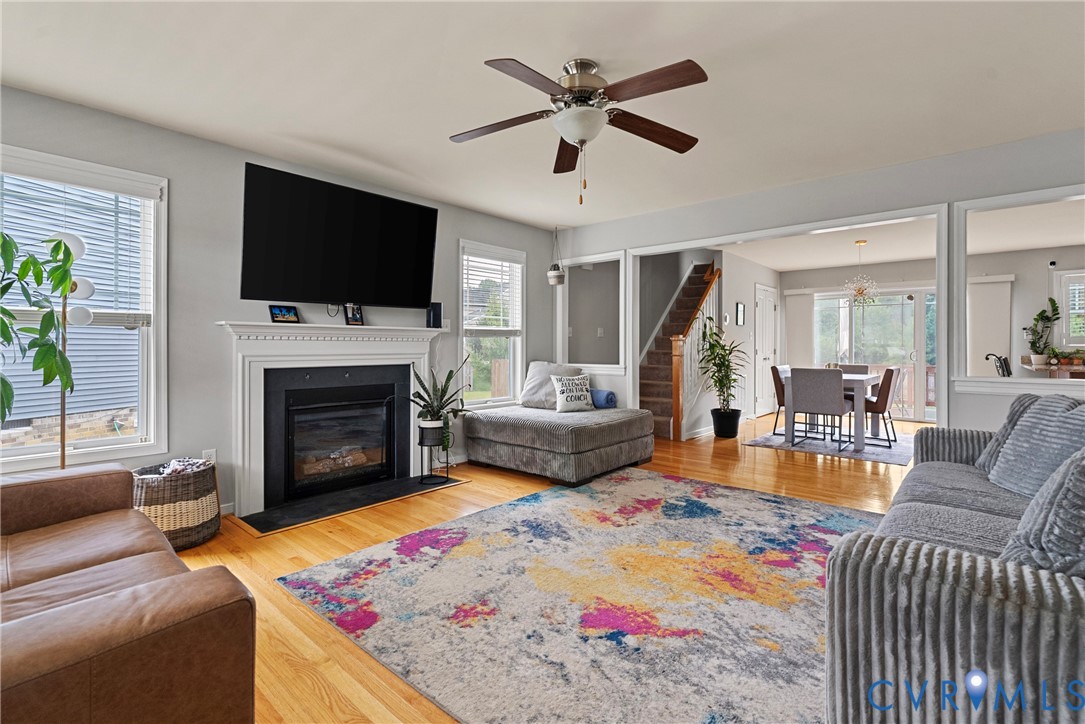 11223 Hill Ridge Court Ashland, VA 23005 - Photo 4 of 35 a living room with furniture fireplace and a flat screen tv